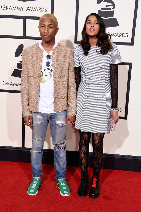 LOS ANGELES, CA - FEBRUARY 15:  Artist Pharrell Williams (L) and Helen Lasichanh  attends The 58th GRAMMY Awards at Staples Center on February 15, 2016 in Los Angeles, California.  (Photo by Steve Granitz/WireImage)