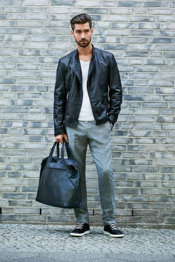 man-with-black-travel-bag